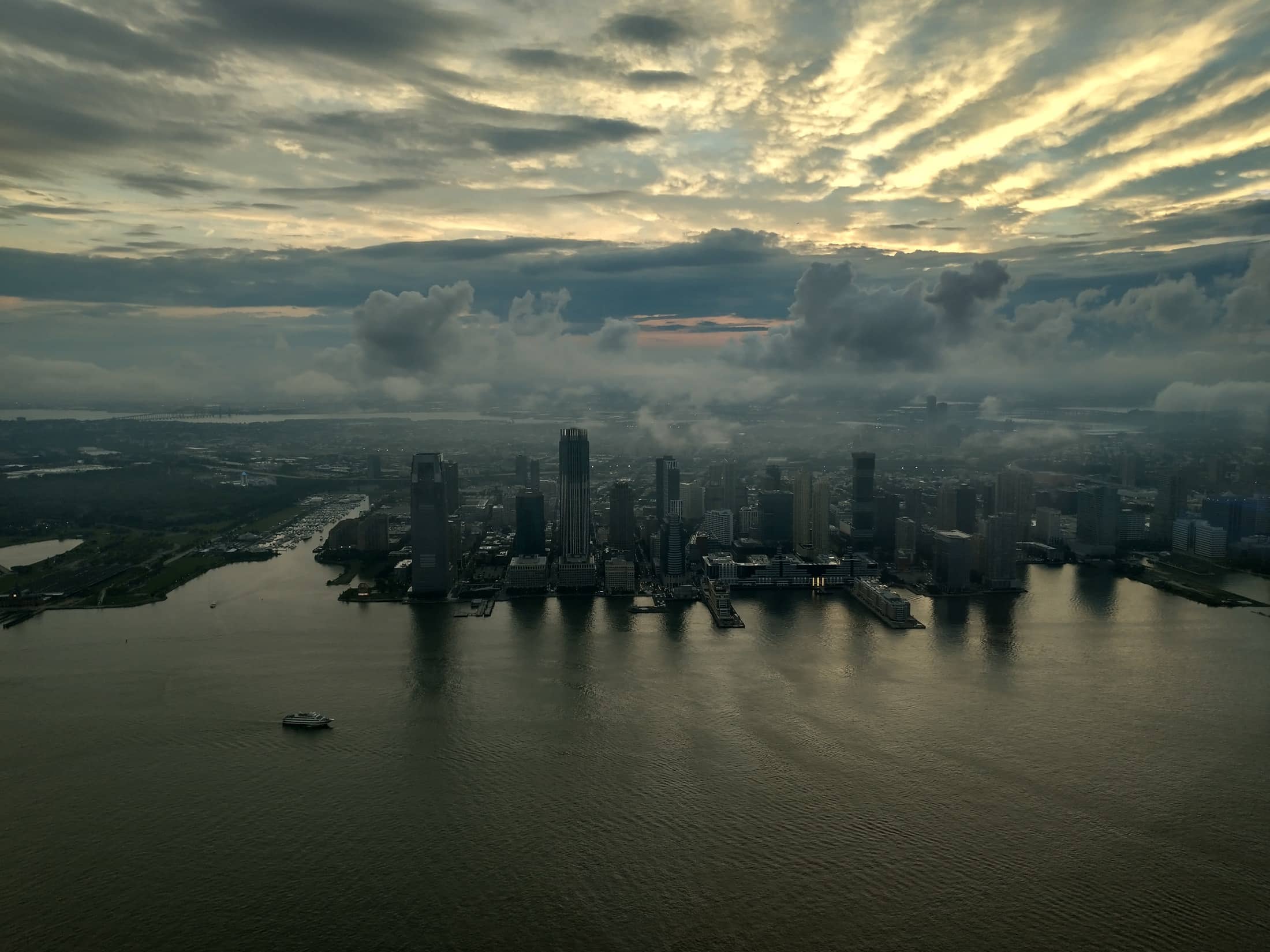 City skyline at twilight above the waterfront