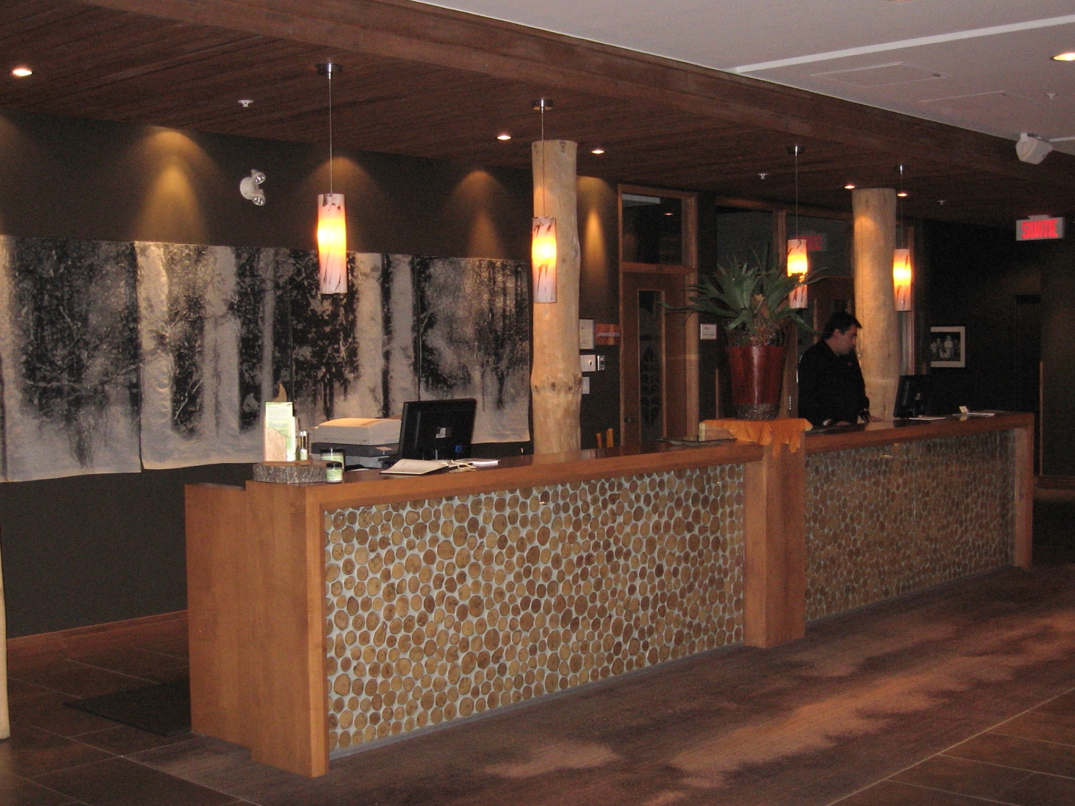 Modern hotel lobby with seating and natural light
