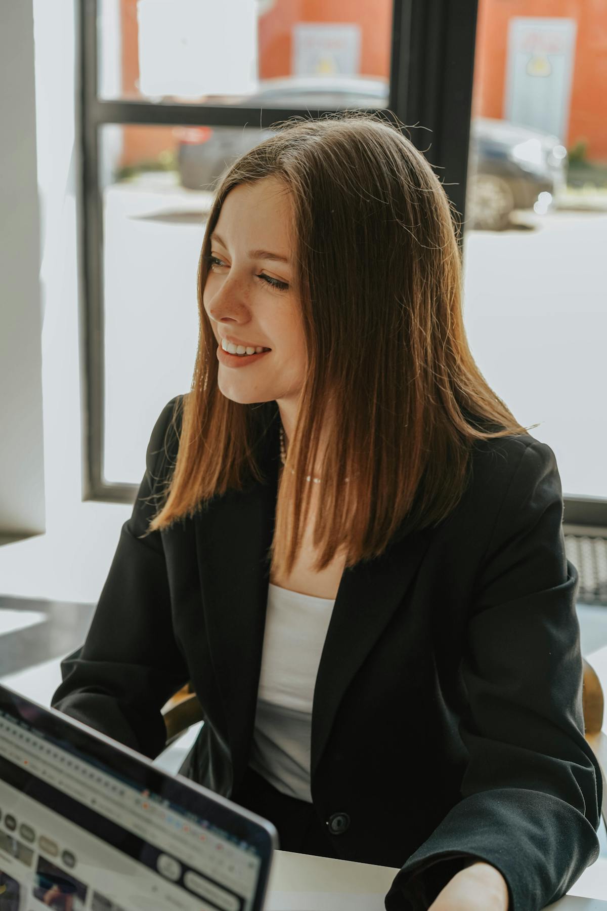 Reservation specialist smiling during a conversation with a client